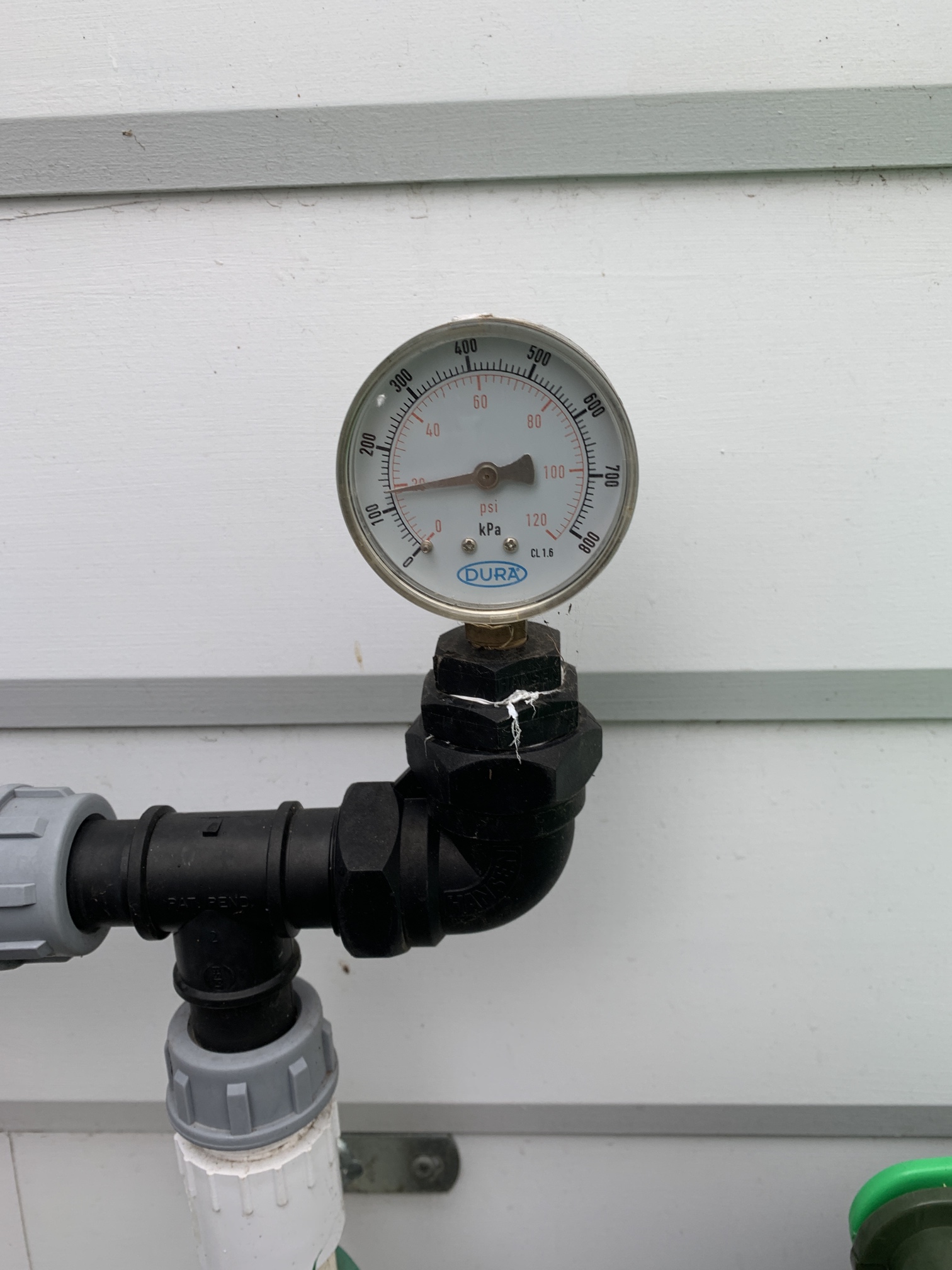A simple pressure sensor installed on a sprinkler system